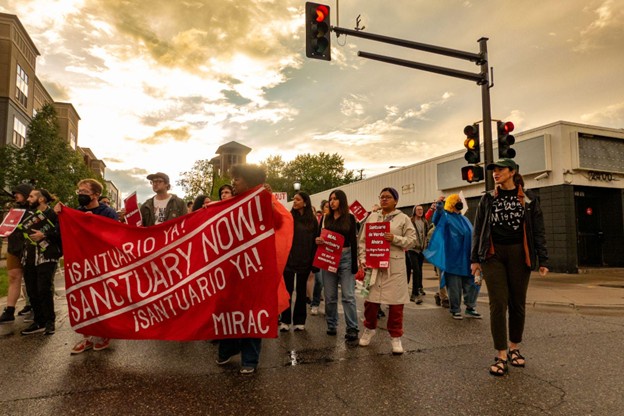 Minneapolis march demands stroger sanctuary city measures adopted.
