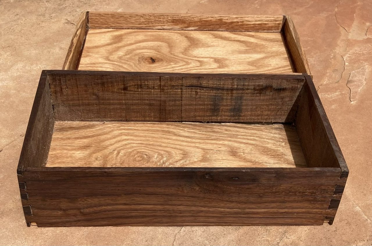 Box of walnut and red oak, open, showing the roughly-finished inside