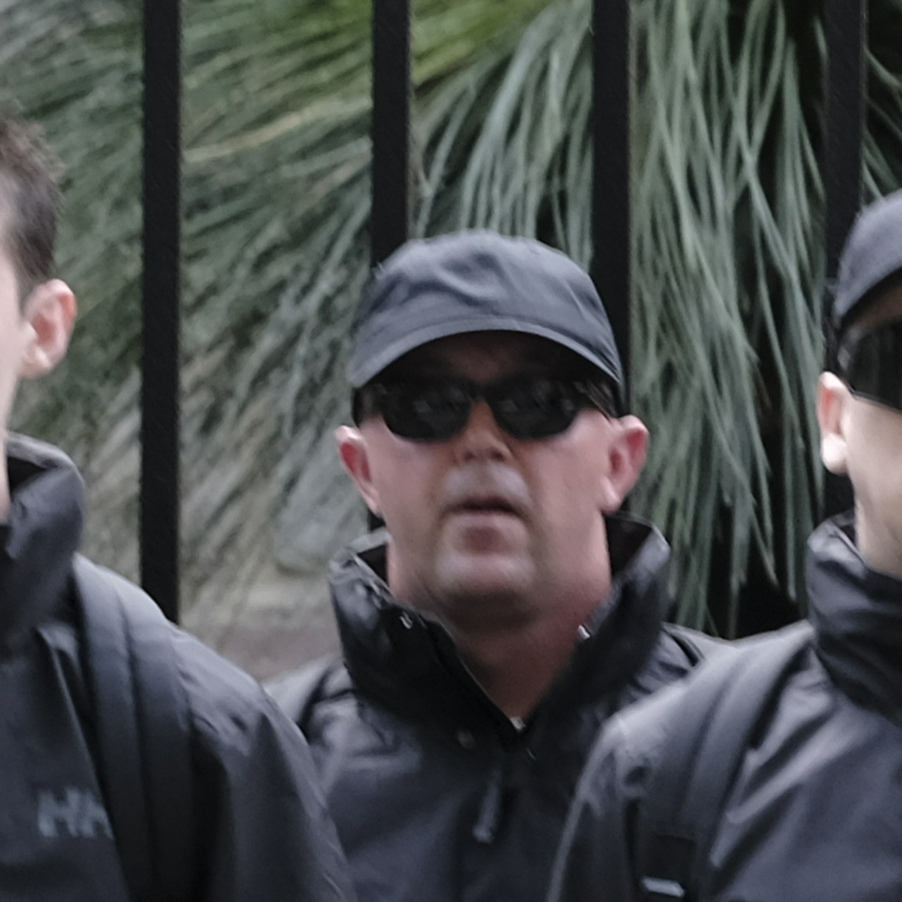 A front-on photo of the same man