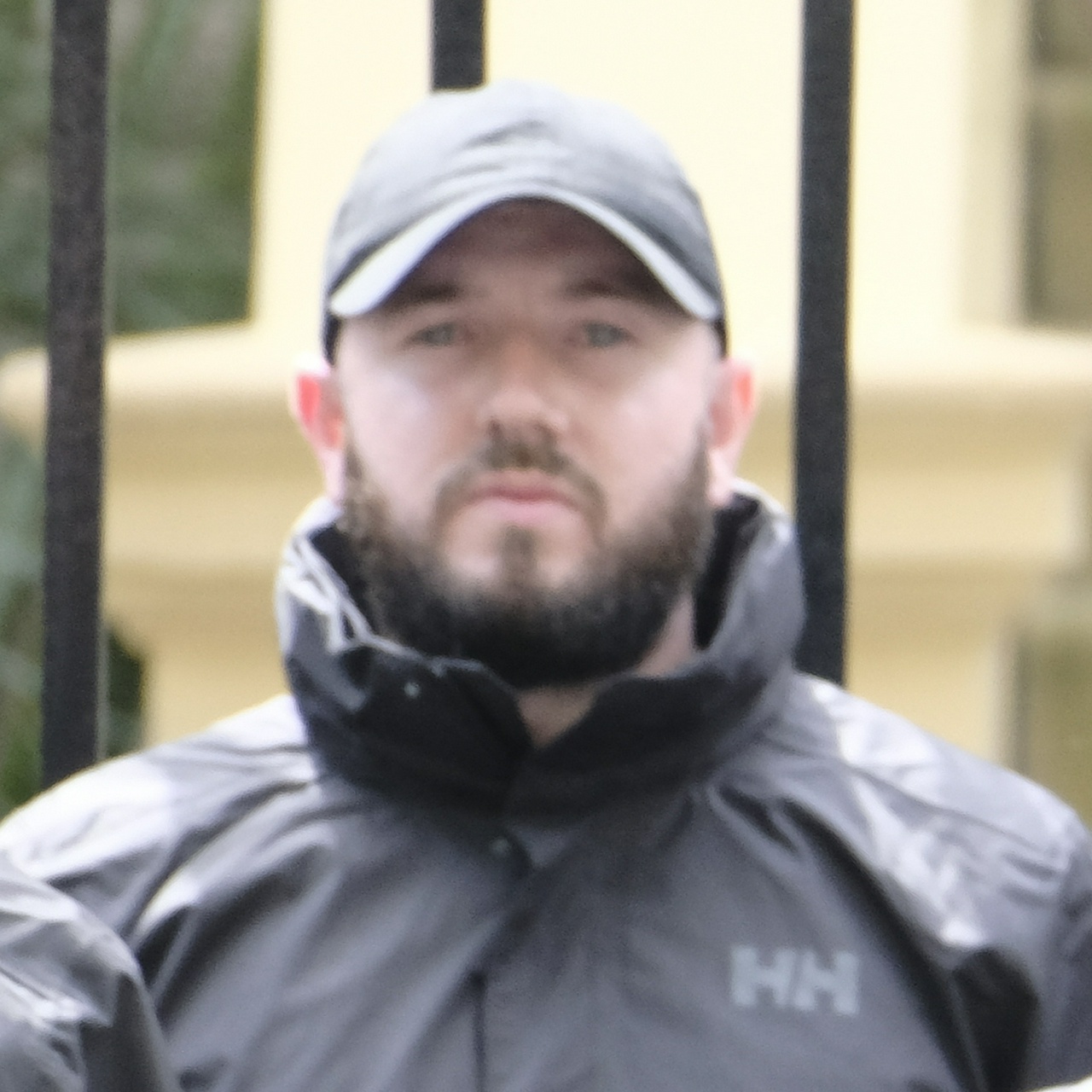 A front-on photo of the same man