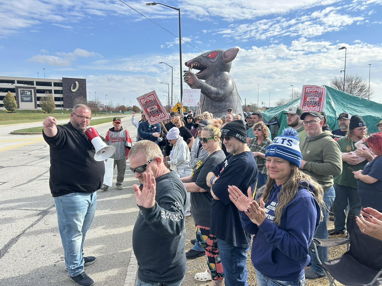 Teamsters Local 135 President Dustin Roach addresses the striking dealers and dual rates outside of Horseshoe on Day 30 of their historic strike for recognition.