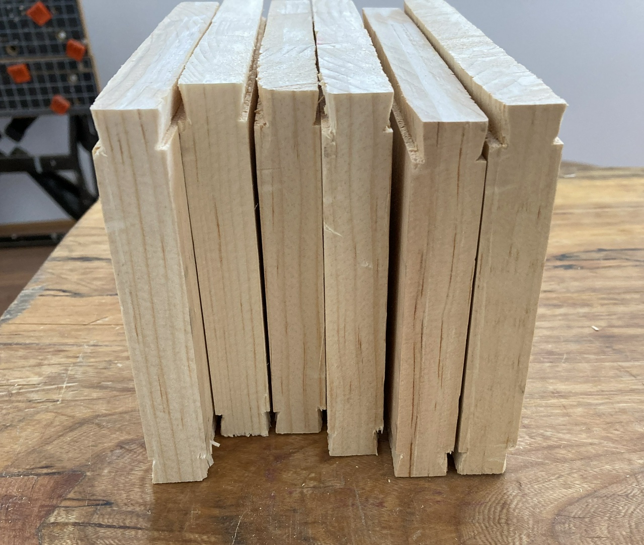 Short uprights for the till, with sliding dovetail pins cut on the ends of them