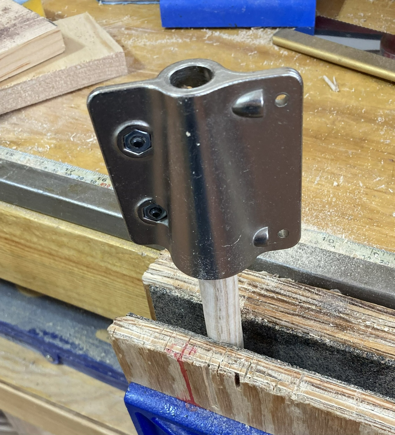 a tapered tenon cutter, putting a taper on the end of the stretcher