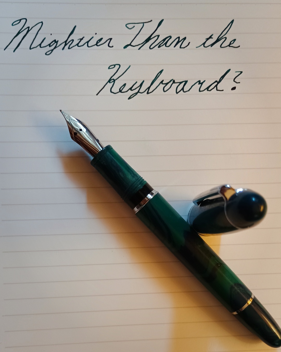 Image: “Mightier Than the Keyboard?” handwritten on a piece of paper with a fountain pen