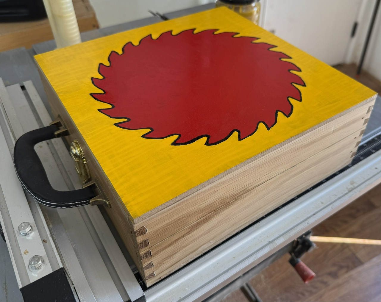 Table saw blade case with painted lid