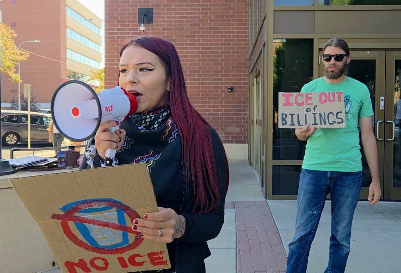 PUB member Brooke Lynn leads chants outside of the Billings, Montana ICE field office