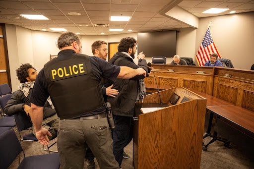 Oak Lawn police try to stop a speaker demanding justice for Murod Kurdi. | FightBack! News