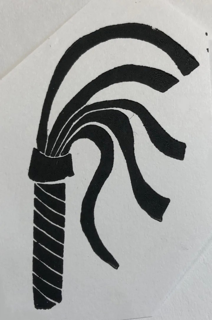a linocut print of a flogger, black ink on white paper. It could use some tidying up - it's not a clean print, and you can see where cat fur happened along the edges, but it was a low-effort doodle.