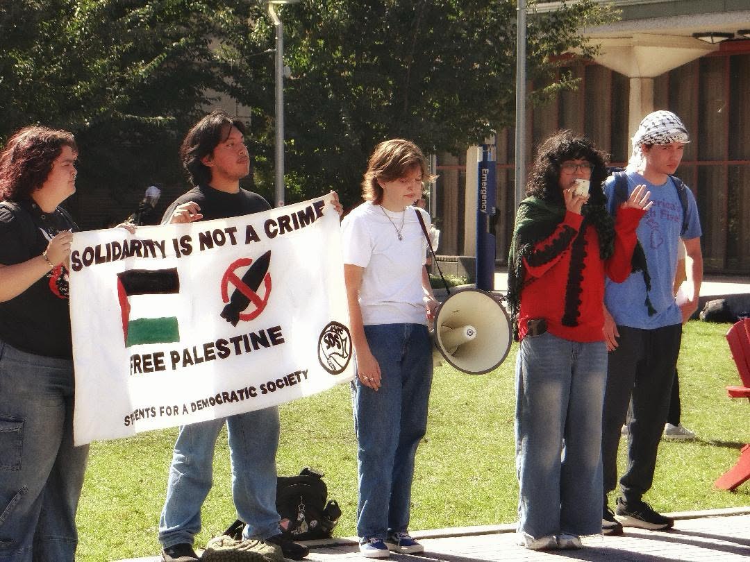 Chicago students stand with Palestine at October 7 protest.