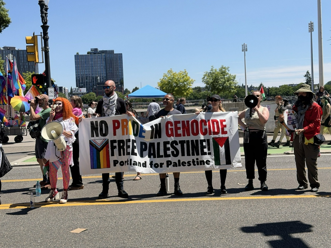 Protest against corporations complicit with the genocide in Palestine at the Portland, Oregon, Pride parade.