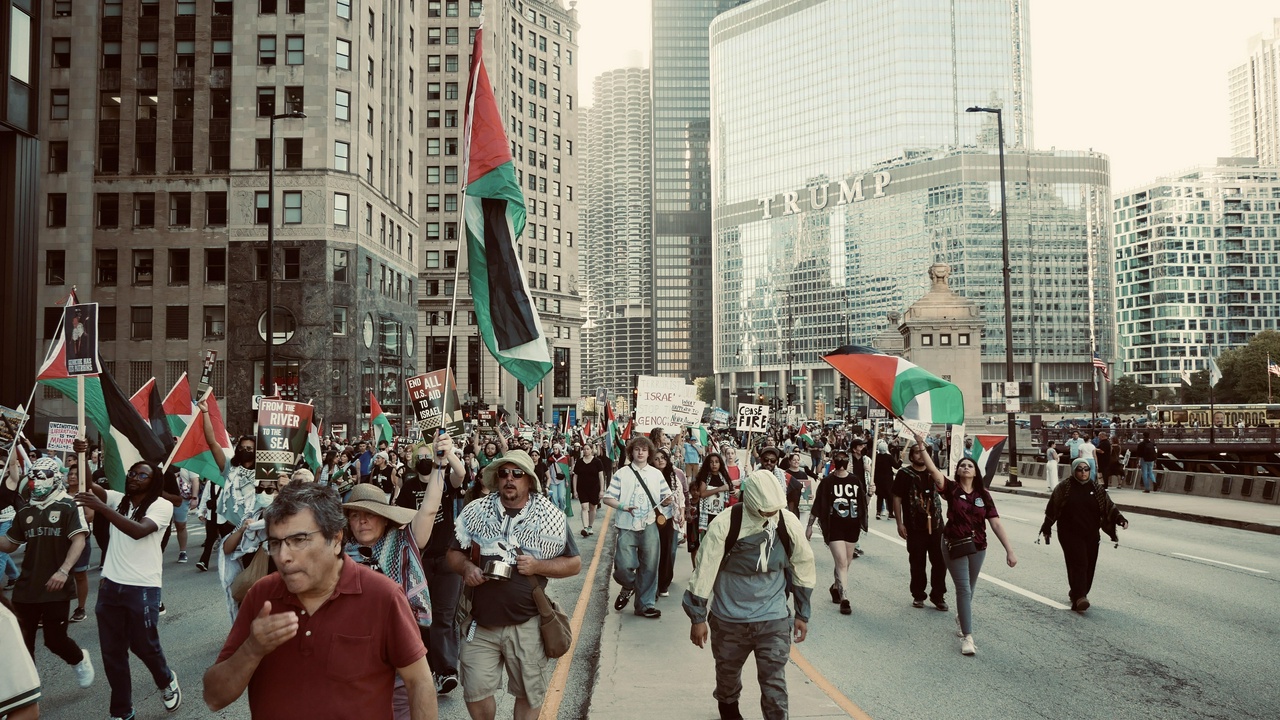 Hundreds march down to protest two years of genocide.