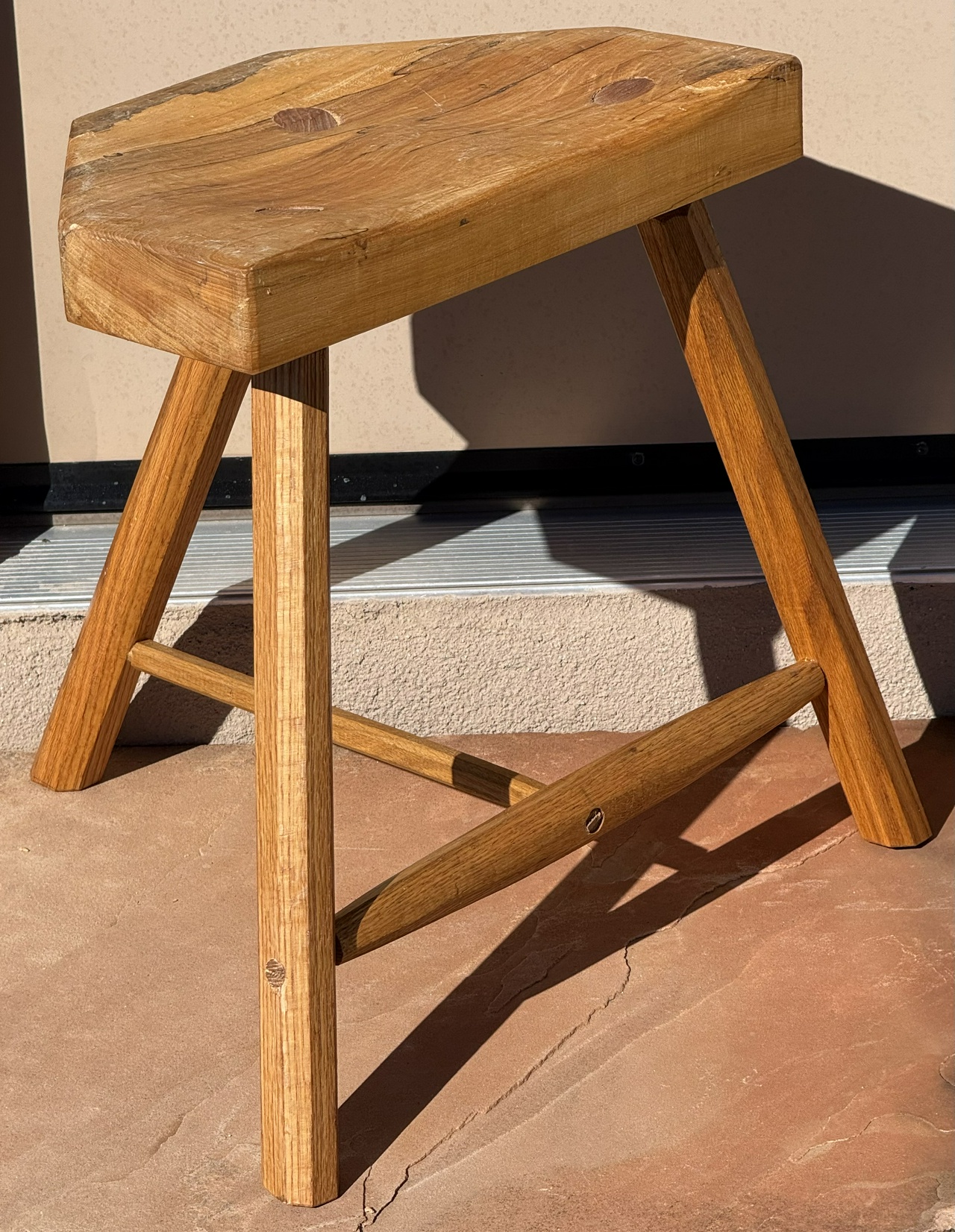 New, shorter stool, seen in front of my shop door in New Mexico sunshine