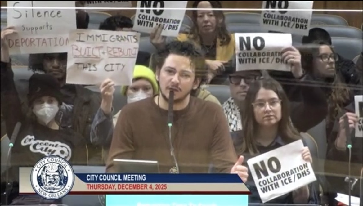 Activist Mich Gonzales gives public comment at city council meeting demanding no collaboration with ICE.
