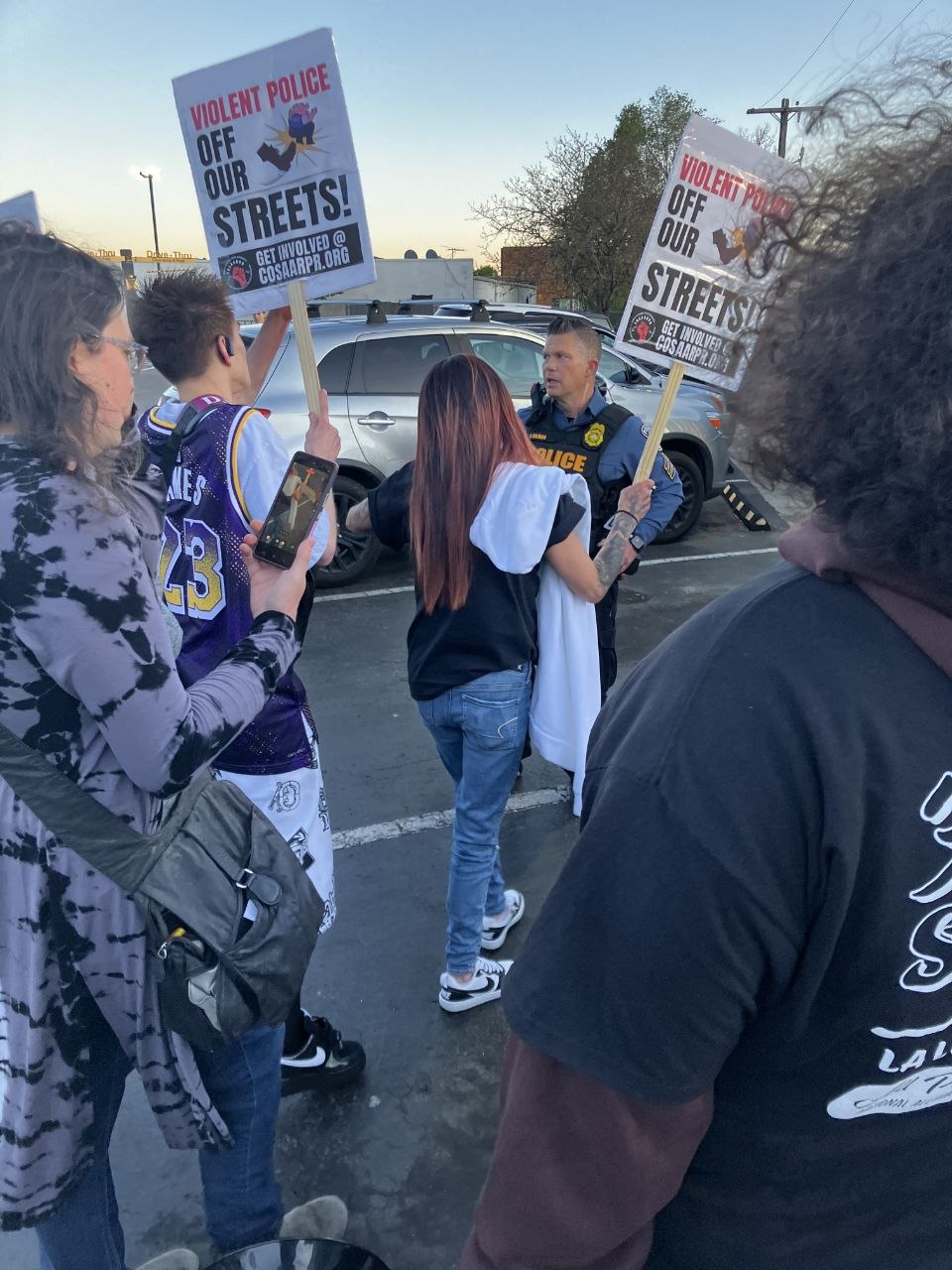Police arrest three at vigil for Benji Greenfield.