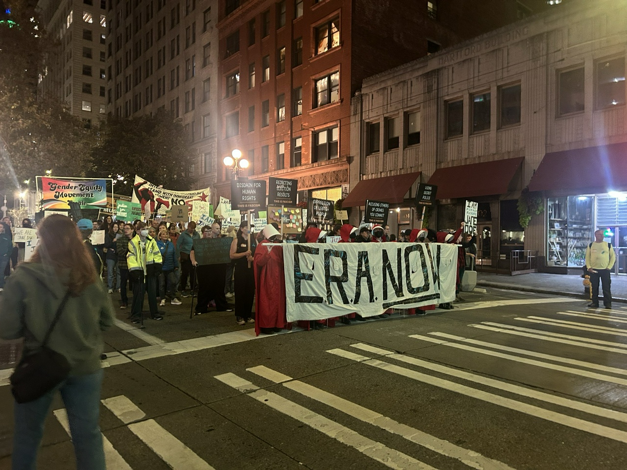 Seattle marched in response to Cornell 7 rapists. | Fight Back! News A group of protesters marching on a street holding signs and banners