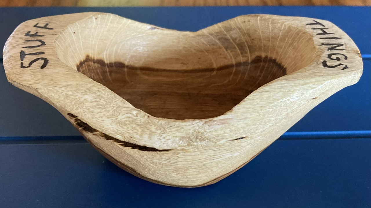 Small carved Gambel Oak bowl, side view