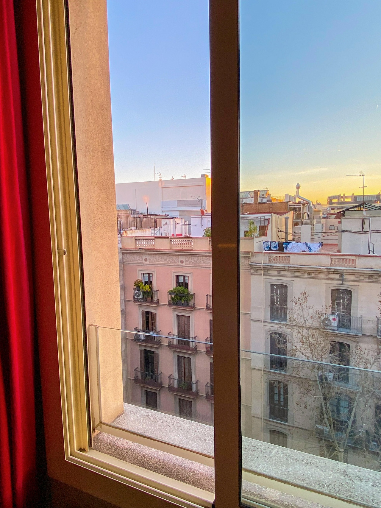 The sunrise from my apartment window in Eixample, Barcelona.
