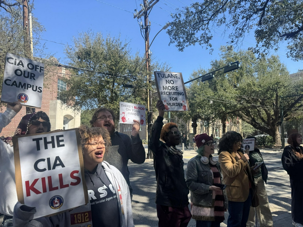 Students protest outside a CIA recruitment event at Tulane.