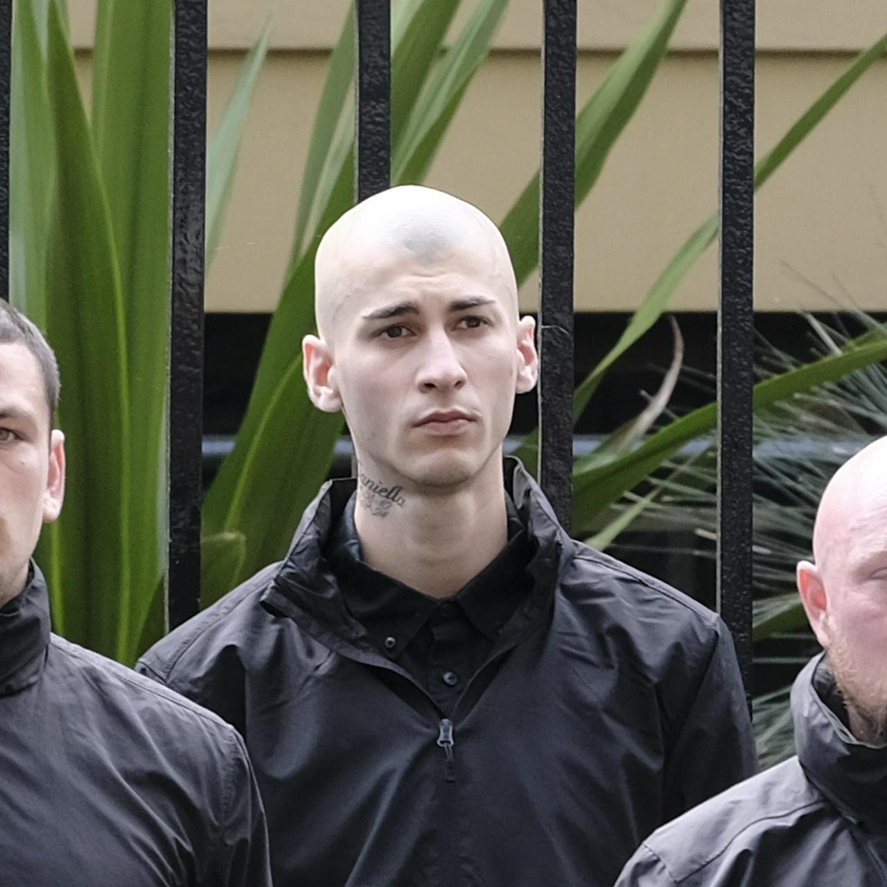 Chris Carrig, a bonehead with small eyes, a large nose, no hair, and a tattoo on his neck that says Daniella, a reference to his dead sister